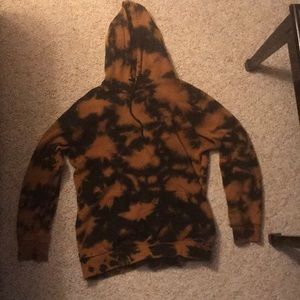 orange and black tie die sweater